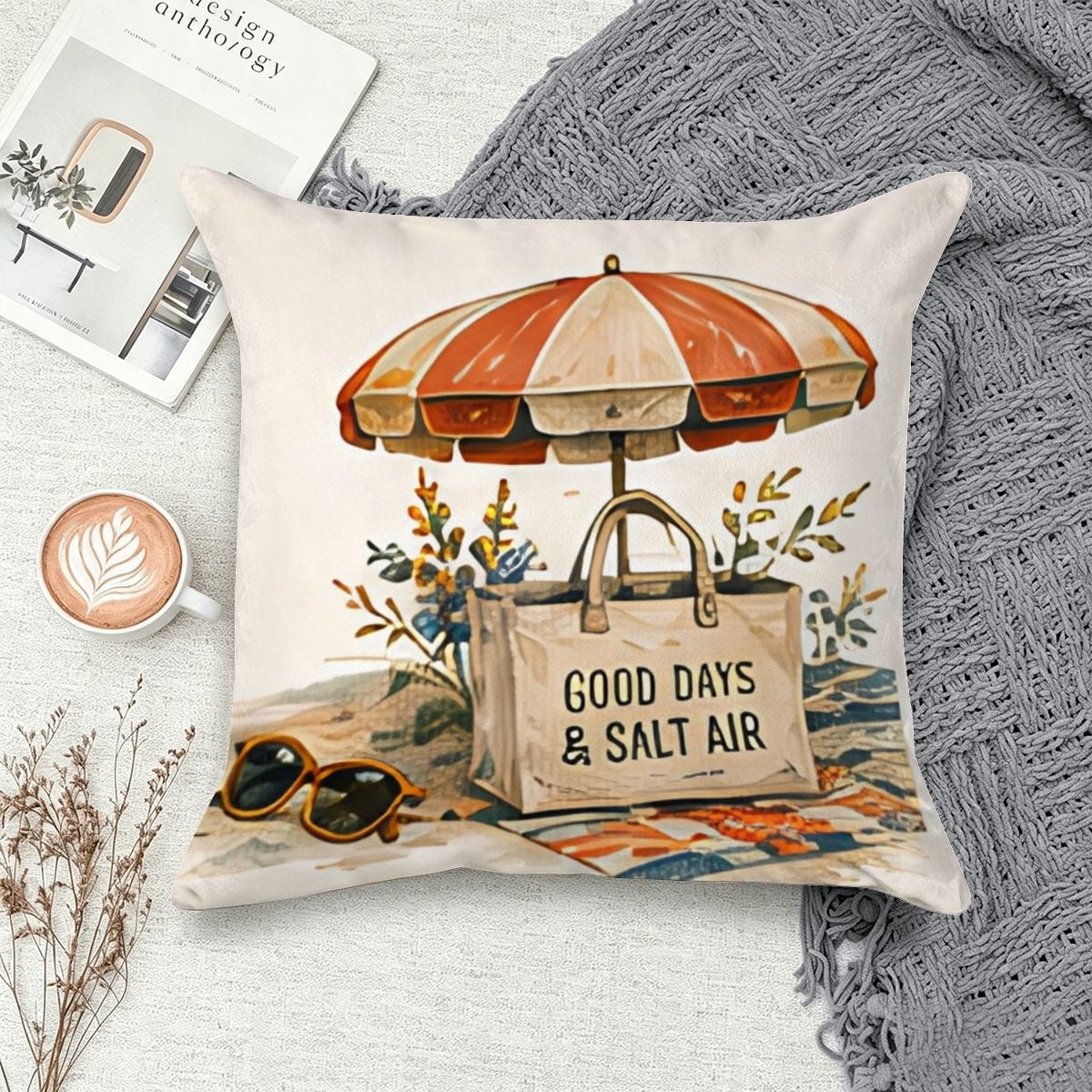 Decorative throw pillow featuring a beach bag, umbrella, and sunglasses with Good Days & Salt Air text.