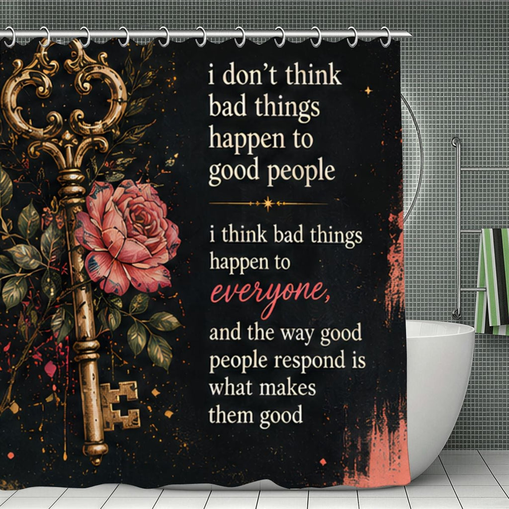 Black shower curtain with golden vintage key, pink roses, and inspirational quote.