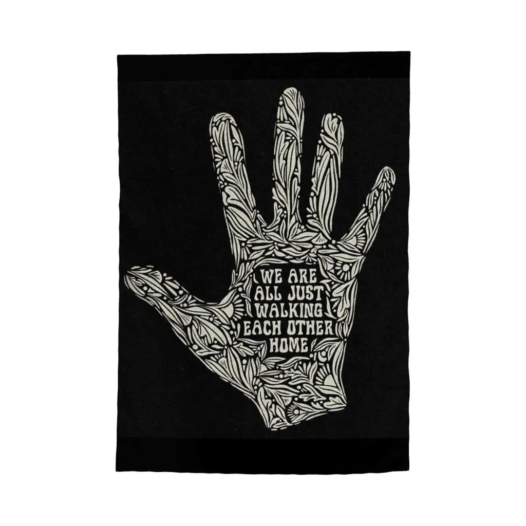 Sandy Beach garden decor flag featuring the "We Are All Just Walking Each Other Home" message, suitable for outdoor display.