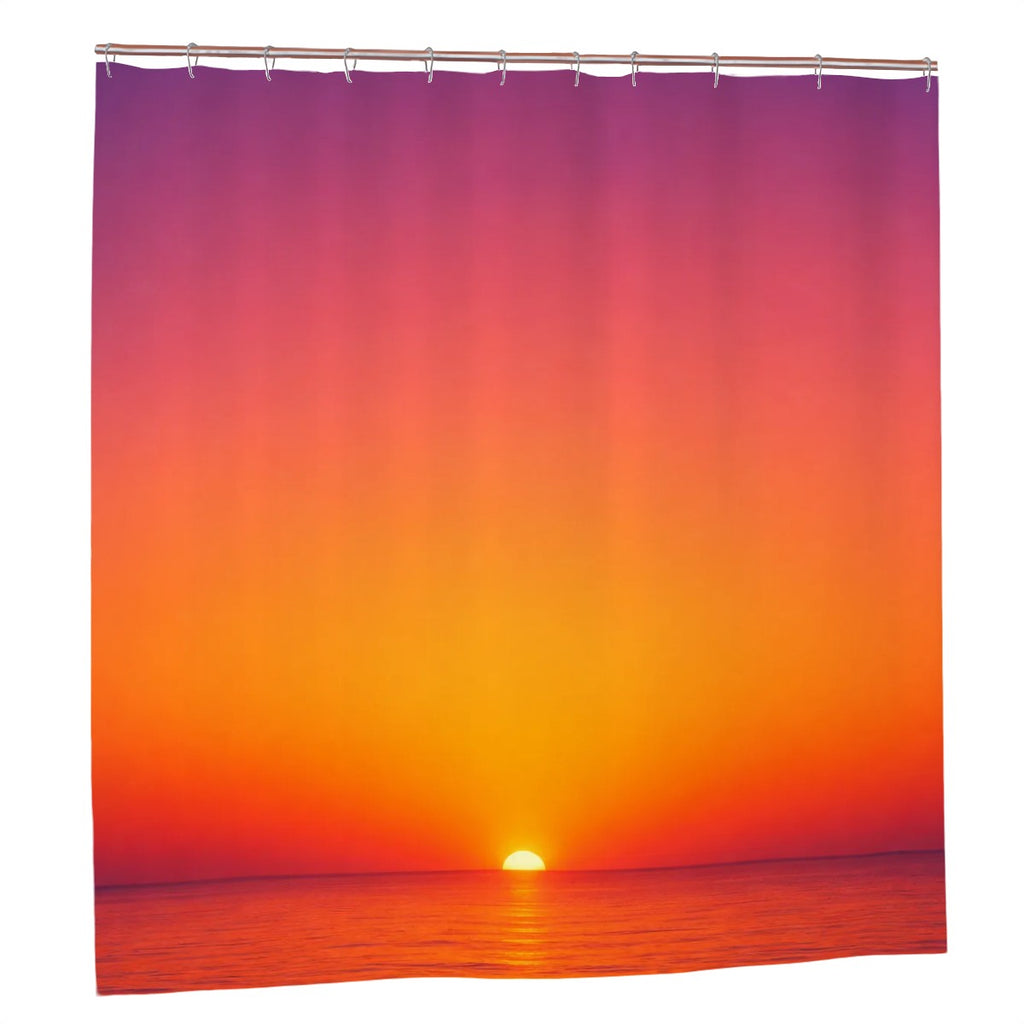 Shower curtain featuring a vibrant orange and purple sunset over the ocean horizon.