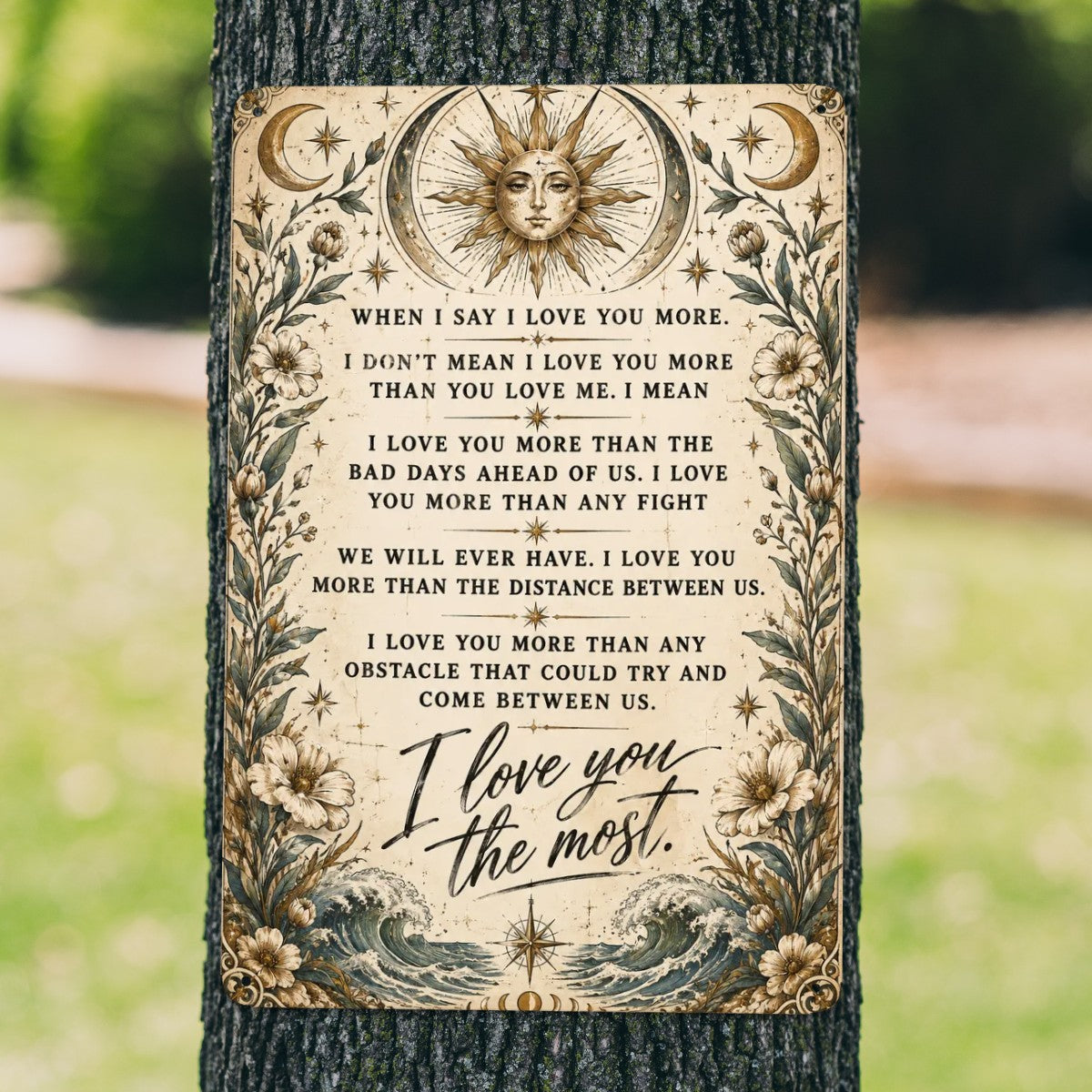 Vintage celestial garden flag with sun, moon, and romantic love quote on a tree.