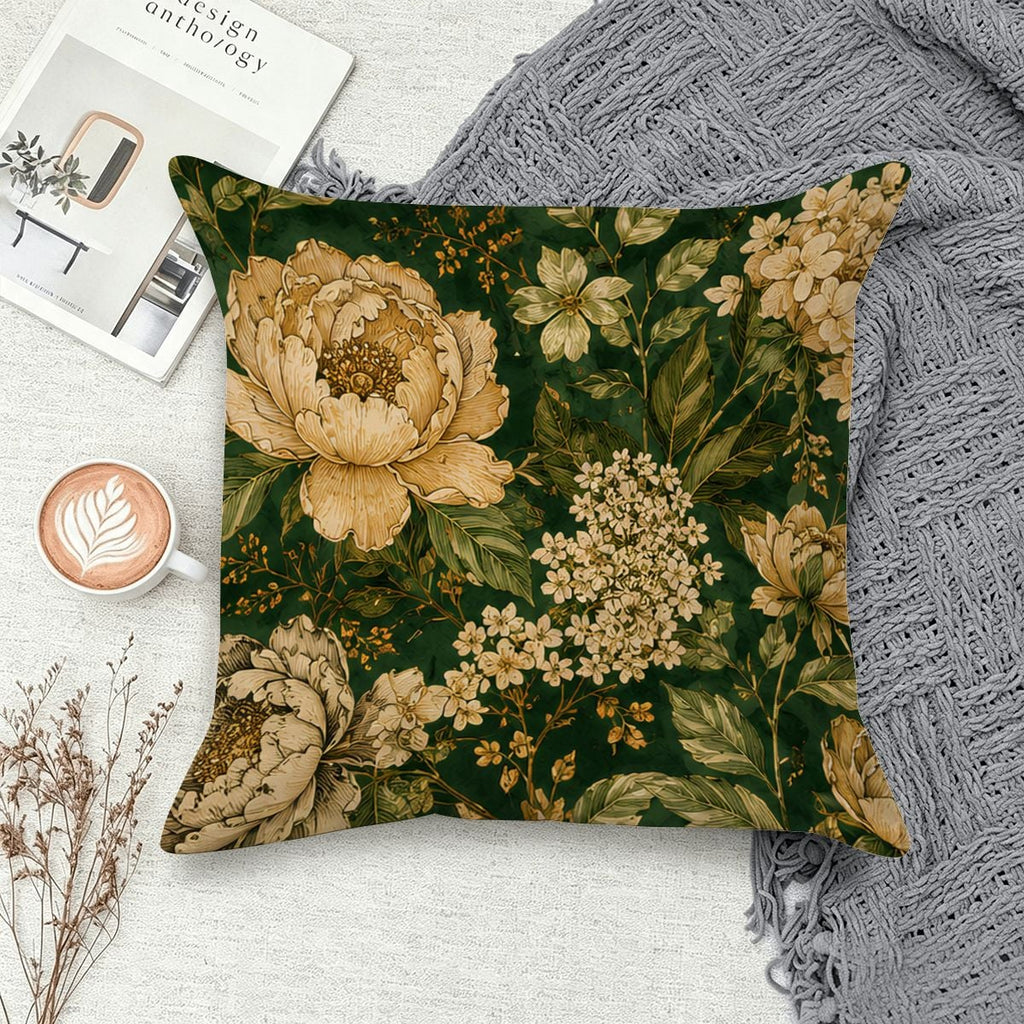 Decorative throw pillow with vintage beige floral pattern on a dark green background.
