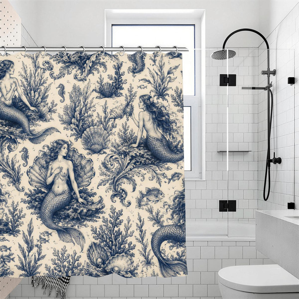 Vintage blue mermaid and seashell pattern shower curtain in a modern white tiled bathroom.