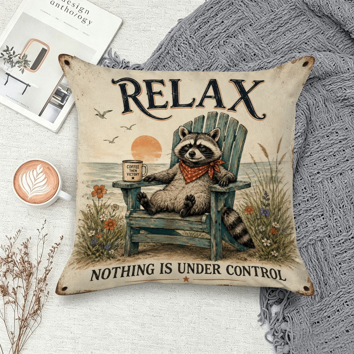 Decorative throw pillow featuring a raccoon in an Adirondack chair with text 'Relax Nothing is under control'.