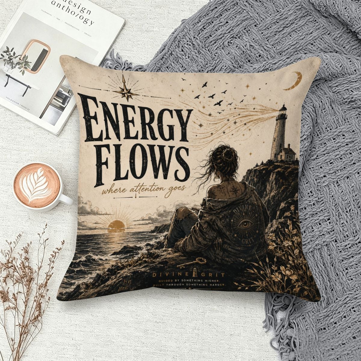 Decorative throw pillow featuring a woman by a lighthouse with 'Energy Flows Where Attention Goes' text.