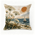 Decorative throw pillow featuring a coastal landscape with white wildflowers and a sailboat.