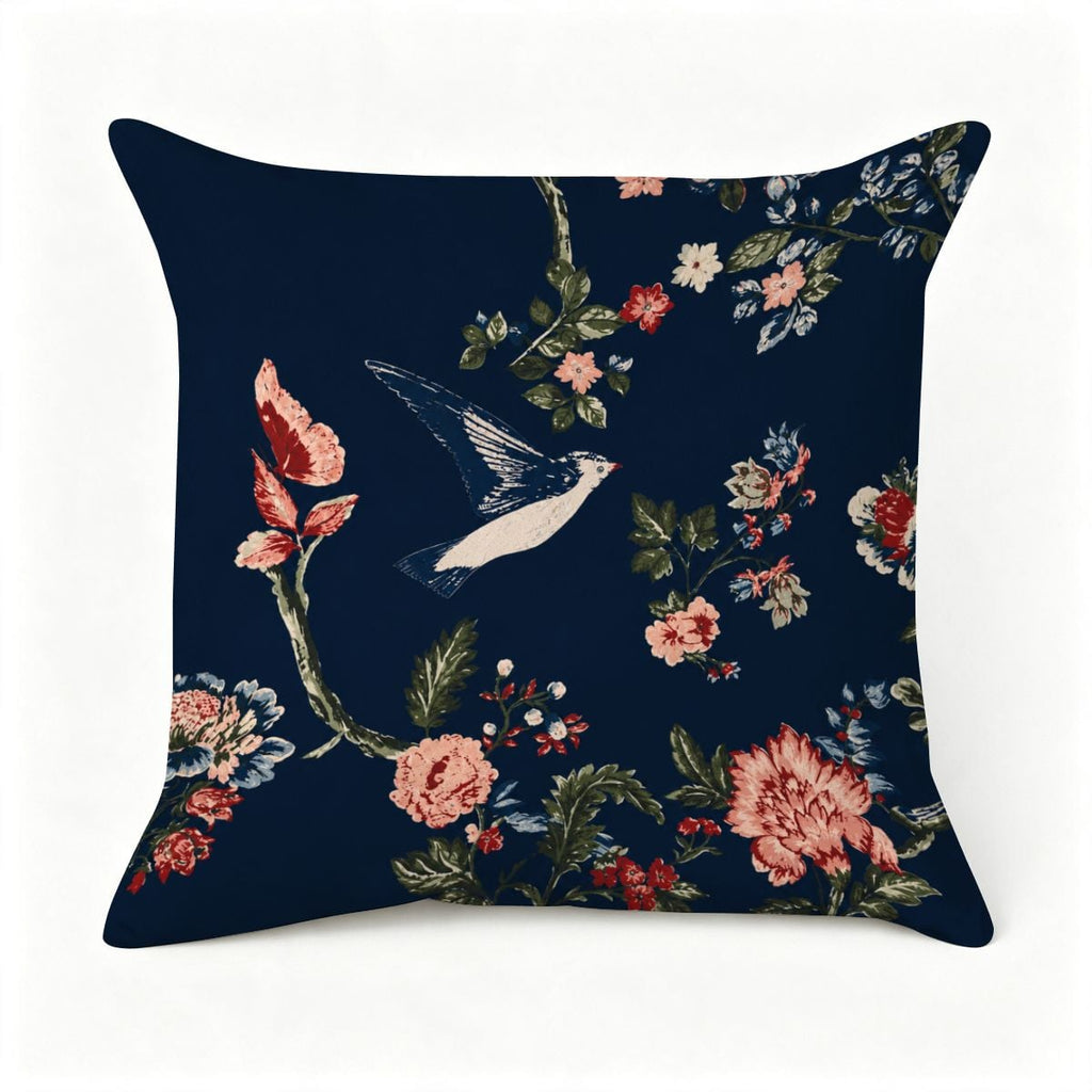 Navy blue decorative throw pillow with vintage floral patterns and a flying bird design.
