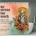 Shower curtain with anatomical heart, floral design, and inspirational quote on watercolor background.