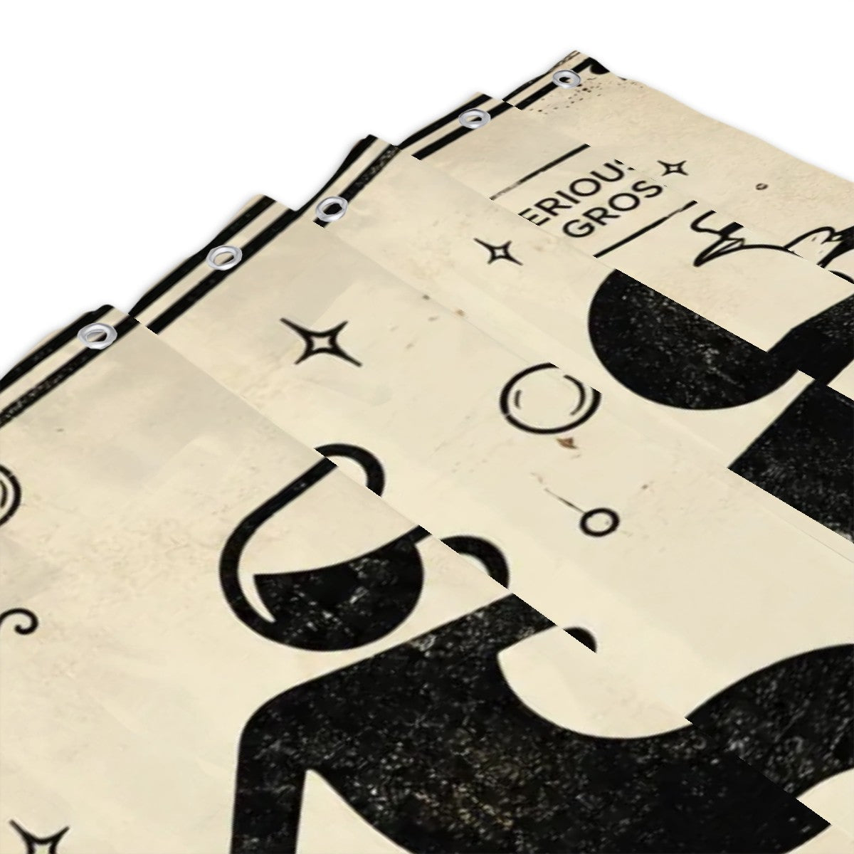 Close-up of a patterned fabric shower curtain with metal grommets and black graphic art.