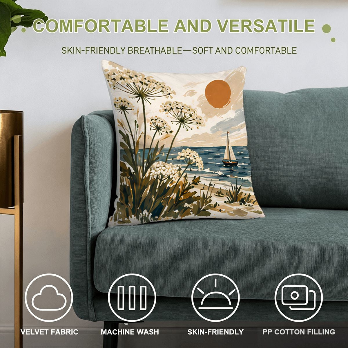 Decorative coastal landscape throw pillow with beach, ocean, and wildflowers on a blue sofa.