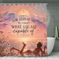 Inspirational shower curtain featuring a sunset mountain landscape and empowering quote.