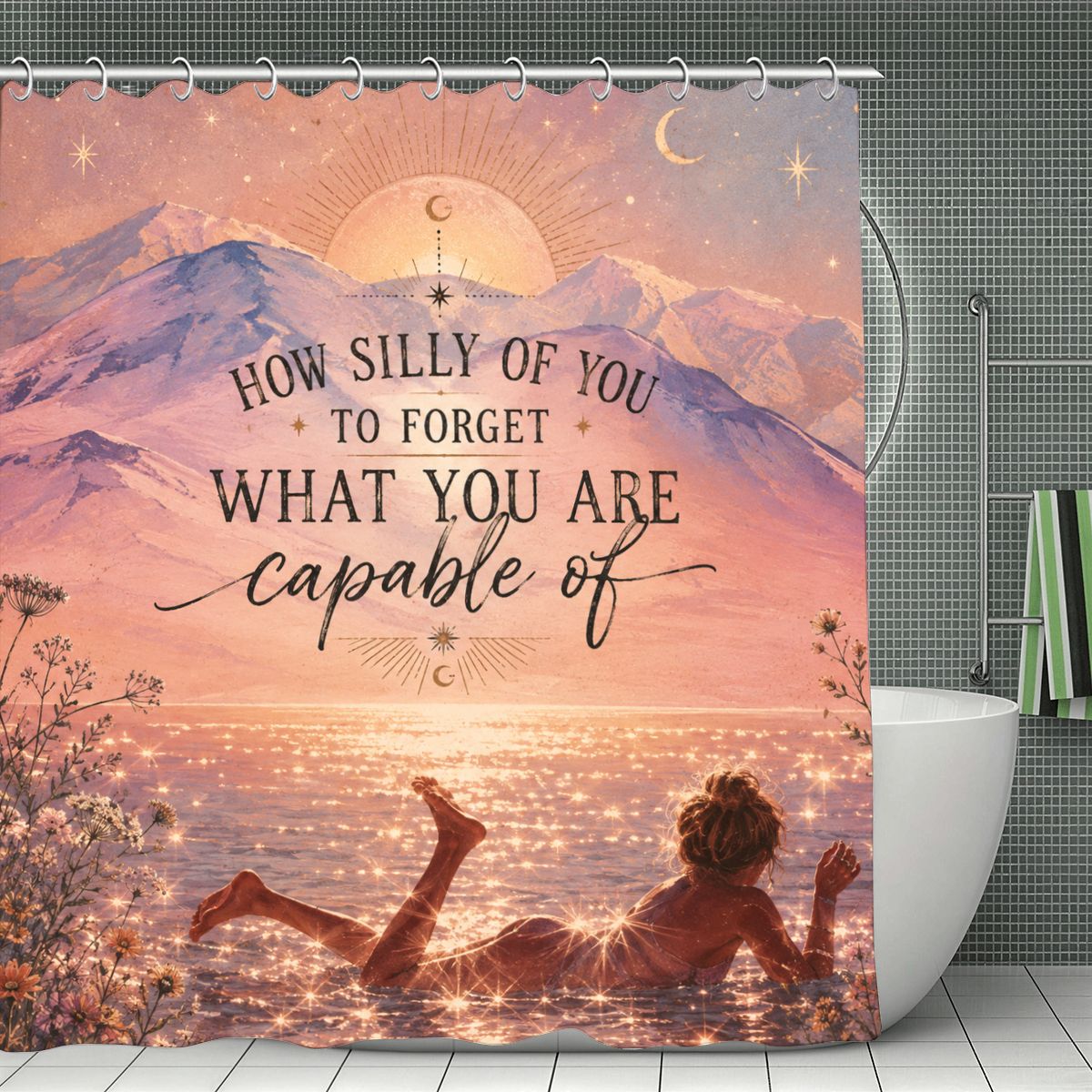 Inspirational shower curtain featuring a sunset mountain landscape and empowering quote.