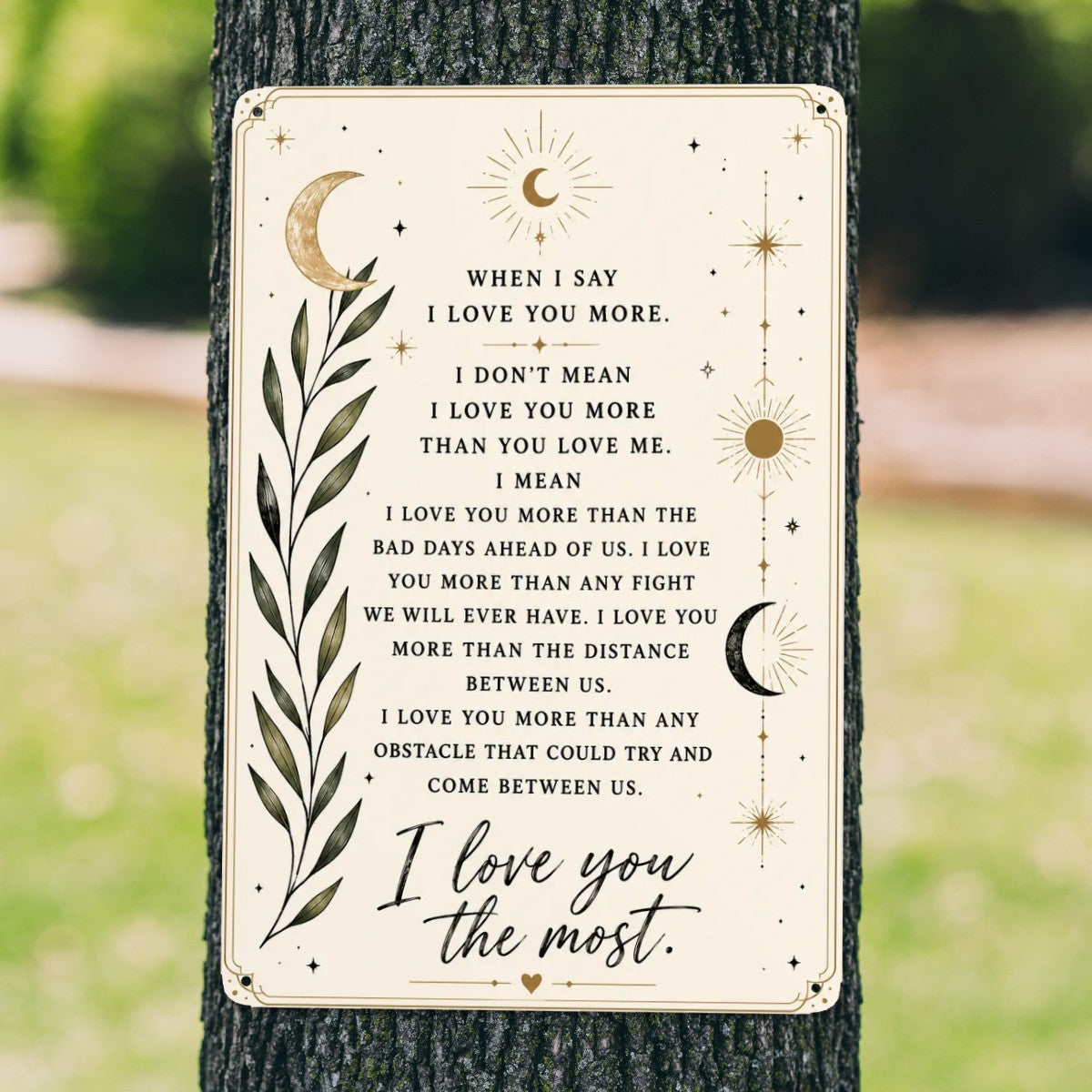 Celestial themed garden flag with romantic quote and gold moon and star illustrations.