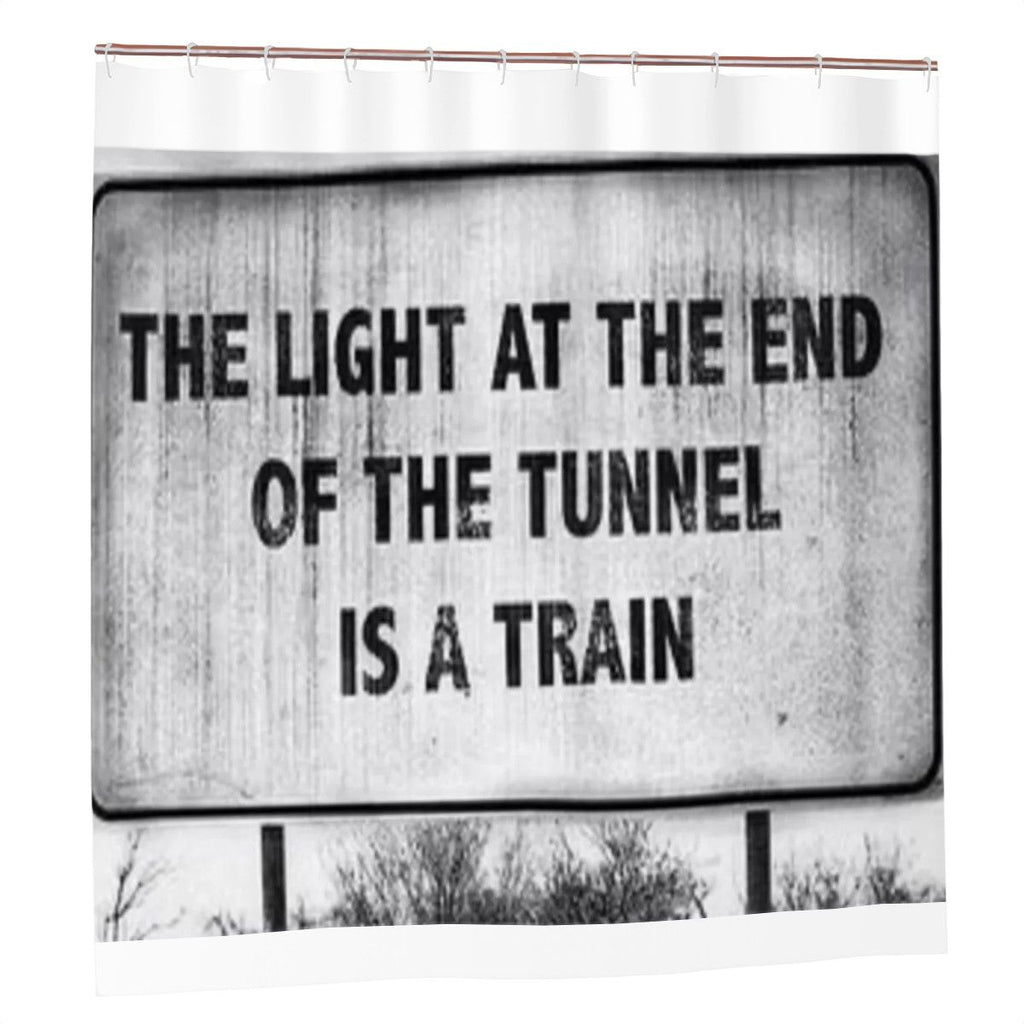 Train shower curtain from Sandy Beach bathroom decor featuring a colorful train design hanging in a bathroom setting.