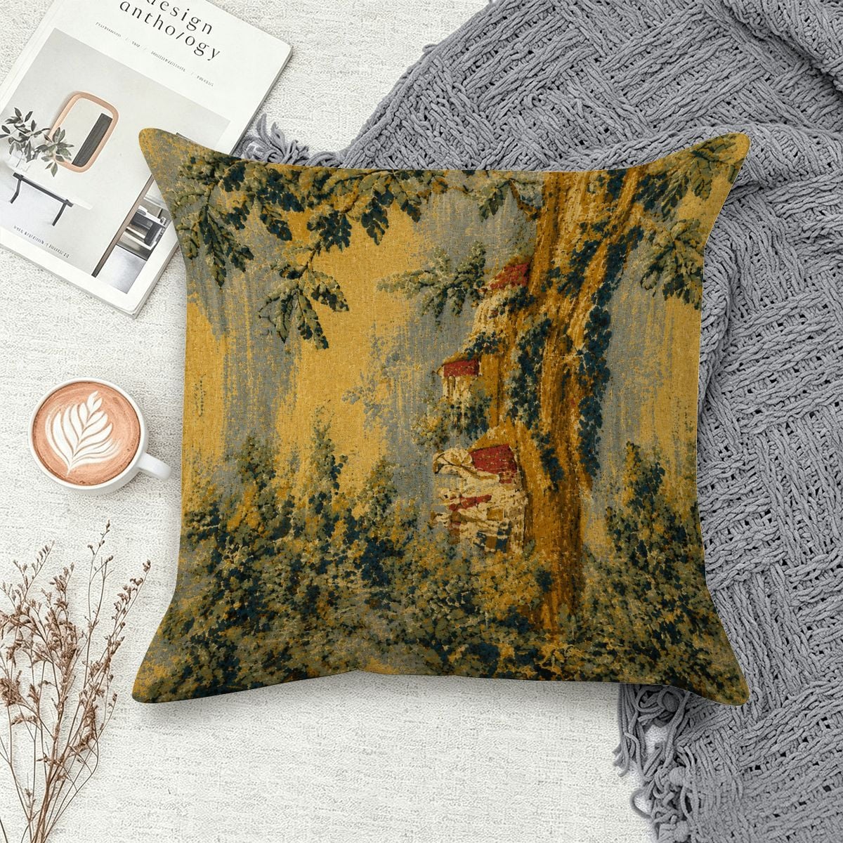 Vintage landscape print throw pillow with forest and cottage scenery in gold and teal tones.
