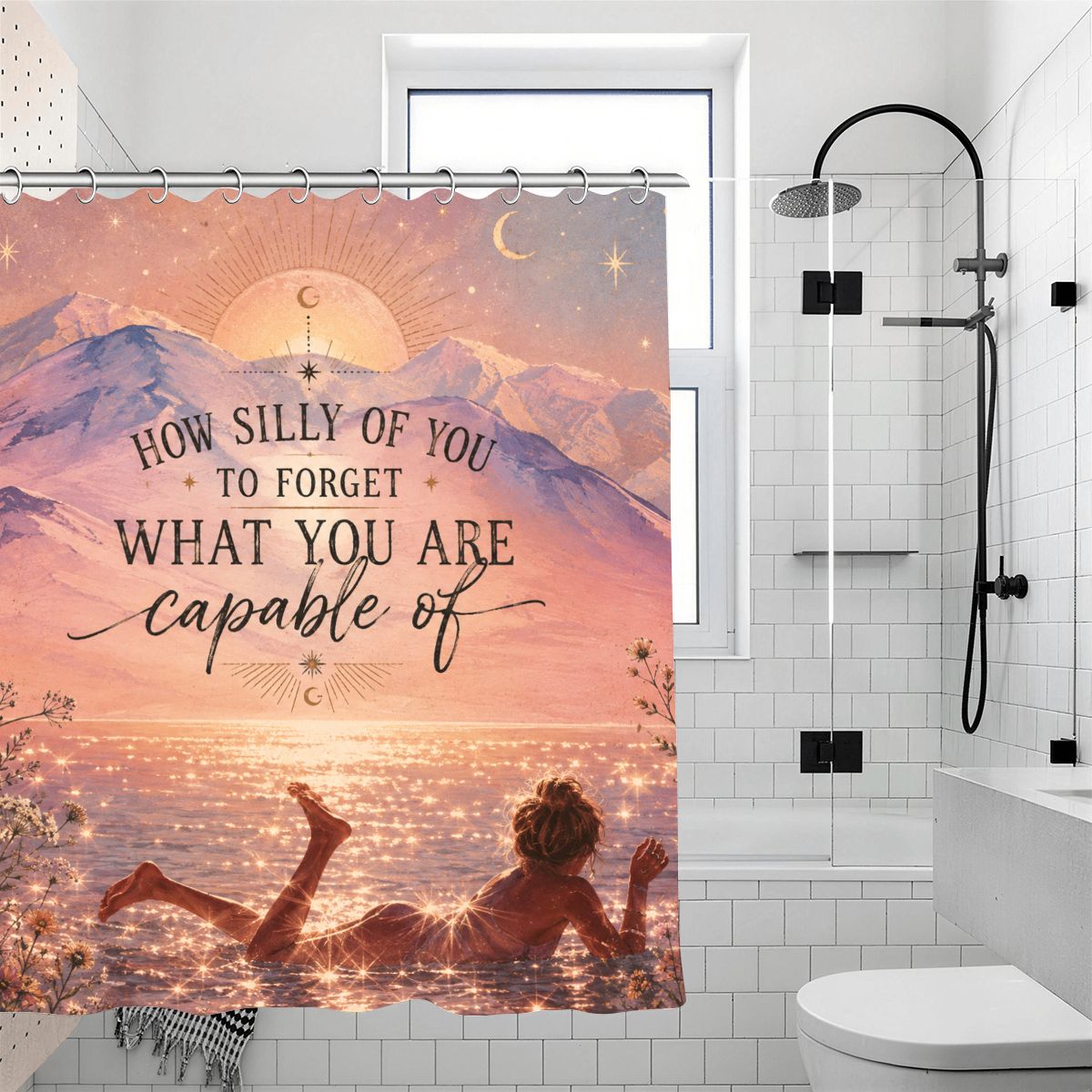 Inspirational shower curtain featuring a sunset mountain landscape and motivational quote.