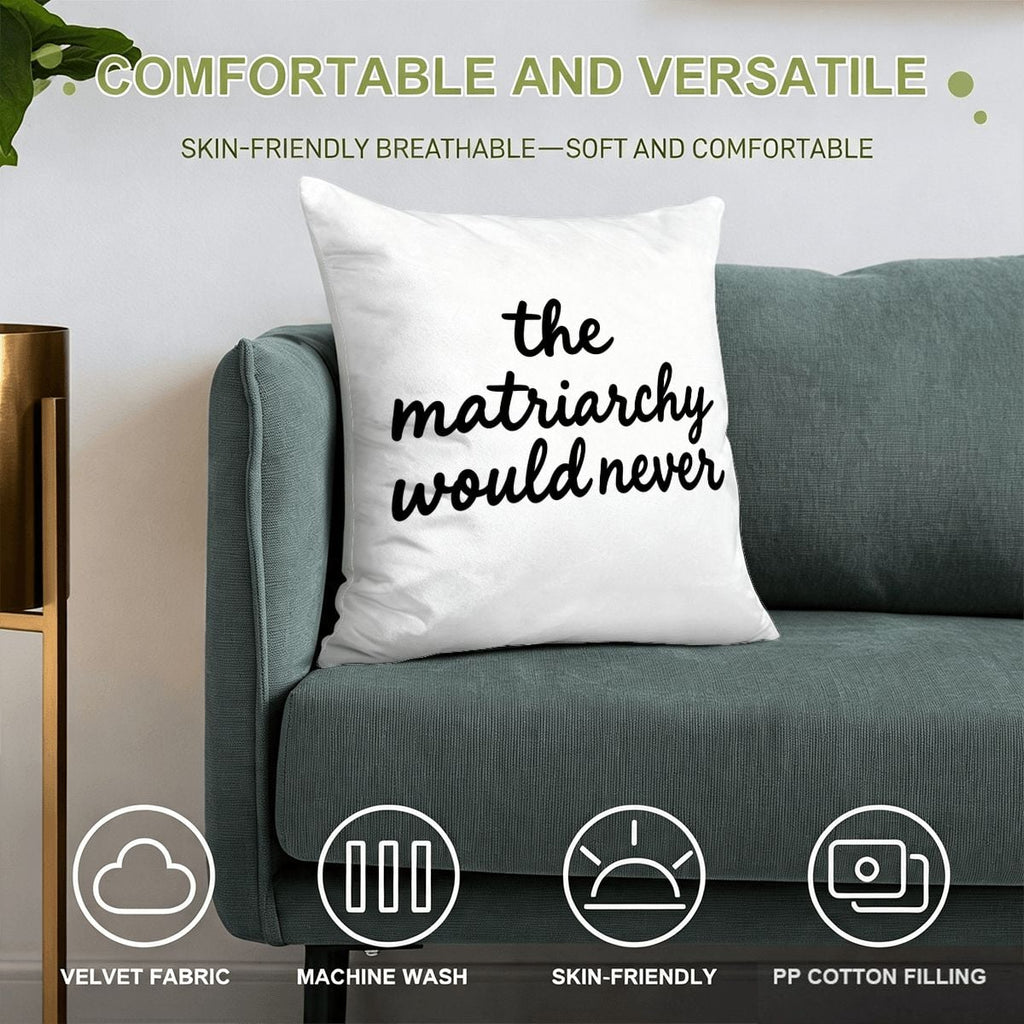 White decorative throw pillow with 'the matriarchy would never' text on a teal sofa.
