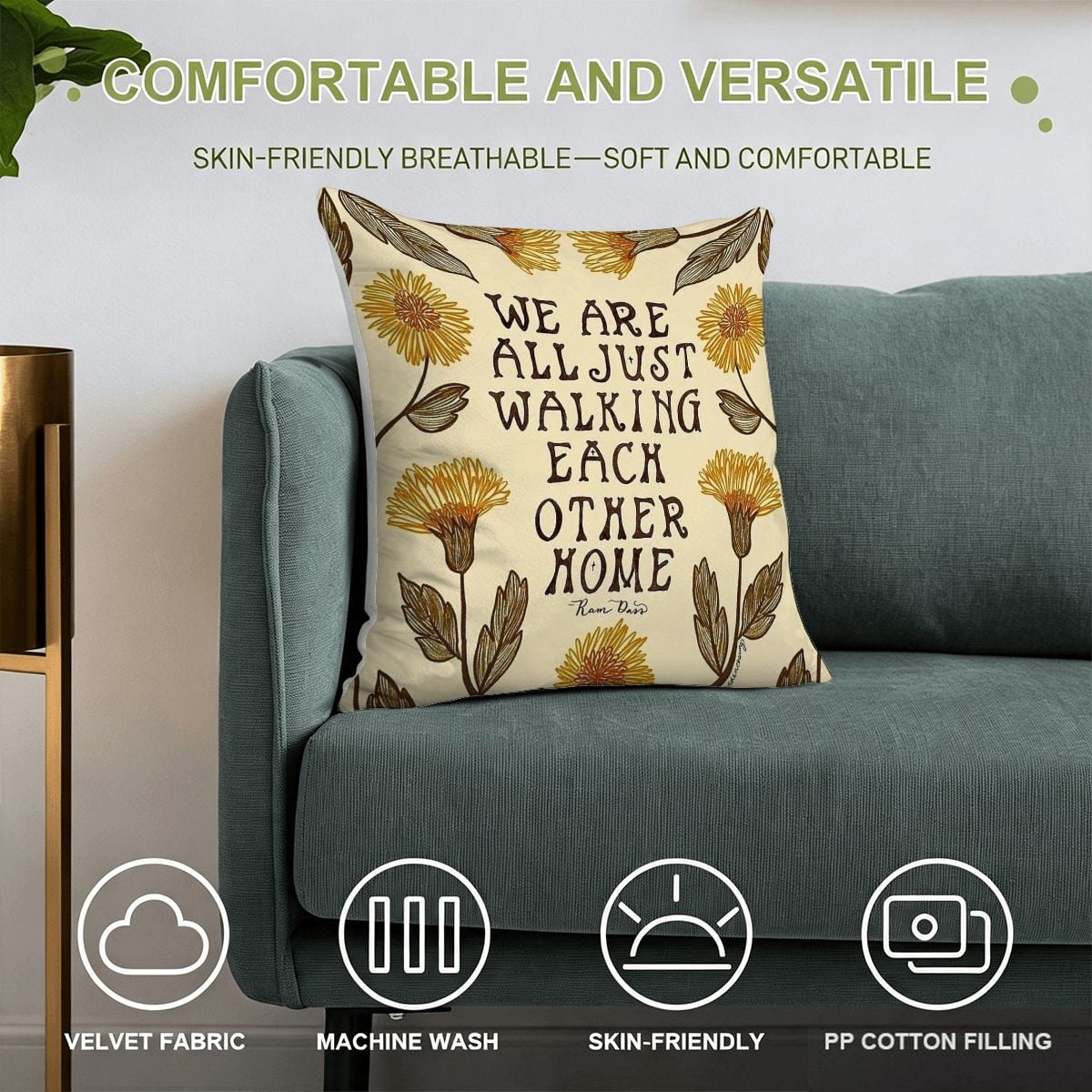 Cream decorative throw pillow with yellow floral design and inspirational quote on a blue sofa.