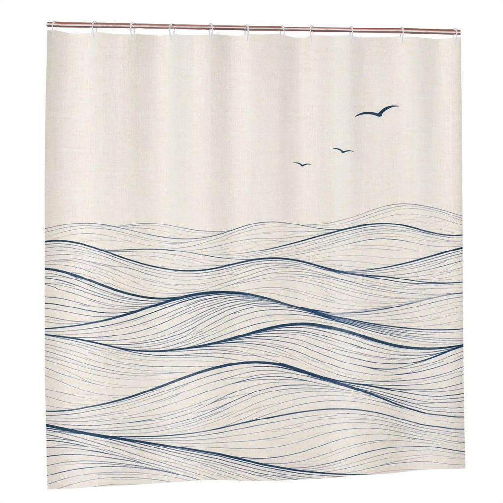 Sandy Beach bathroom decor shower curtain with ocean wave design hanging in a modern shower area