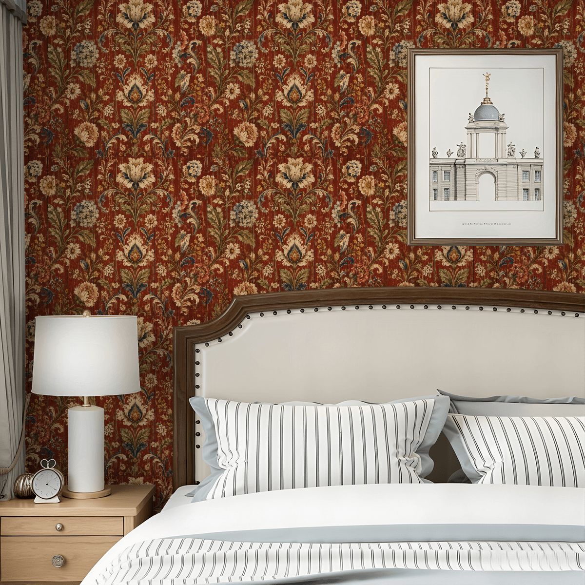 Bedroom with floral patterned wallpaper, a white headboard, and a bedside lamp.