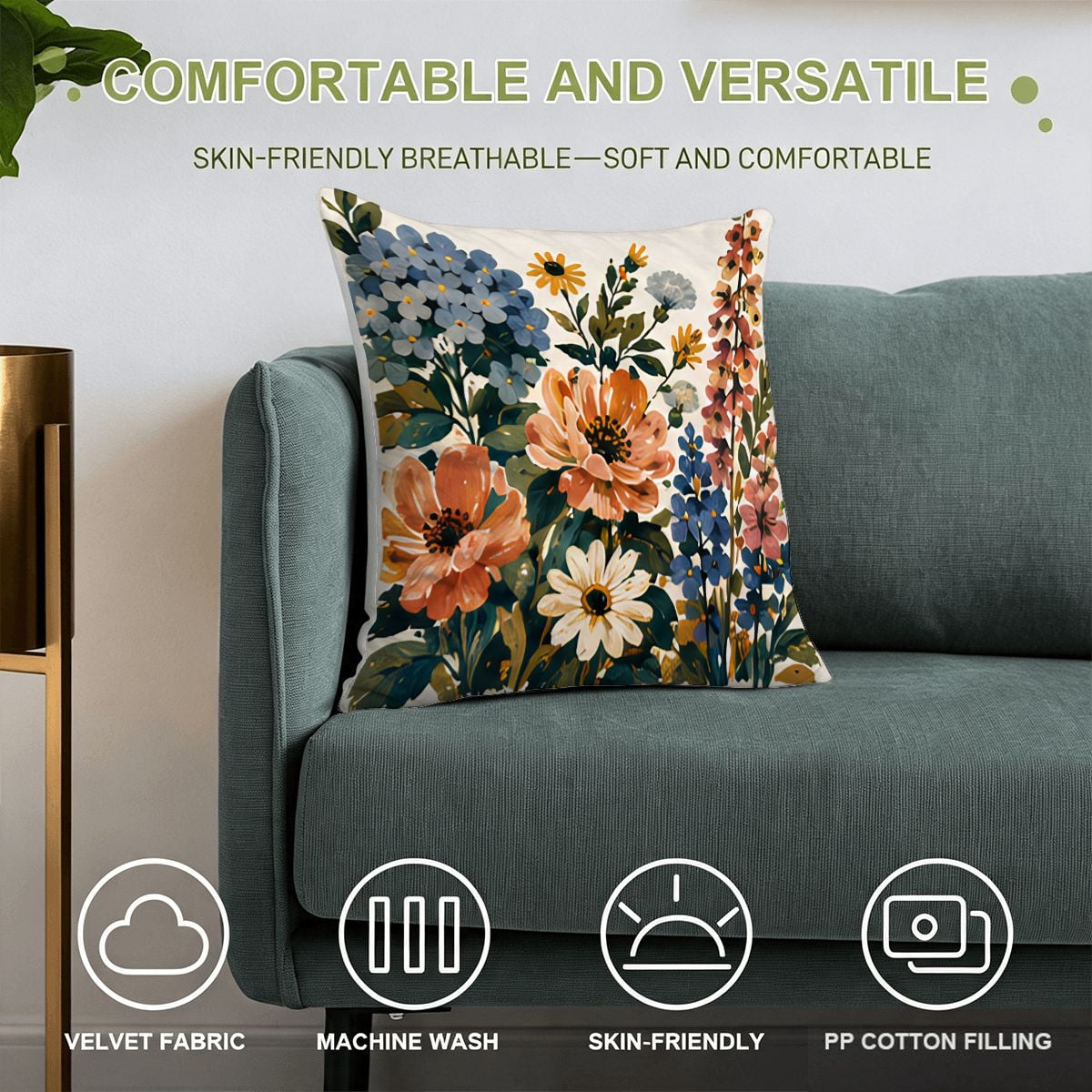 Floral print velvet throw pillow with colorful wildflowers on a teal sofa.