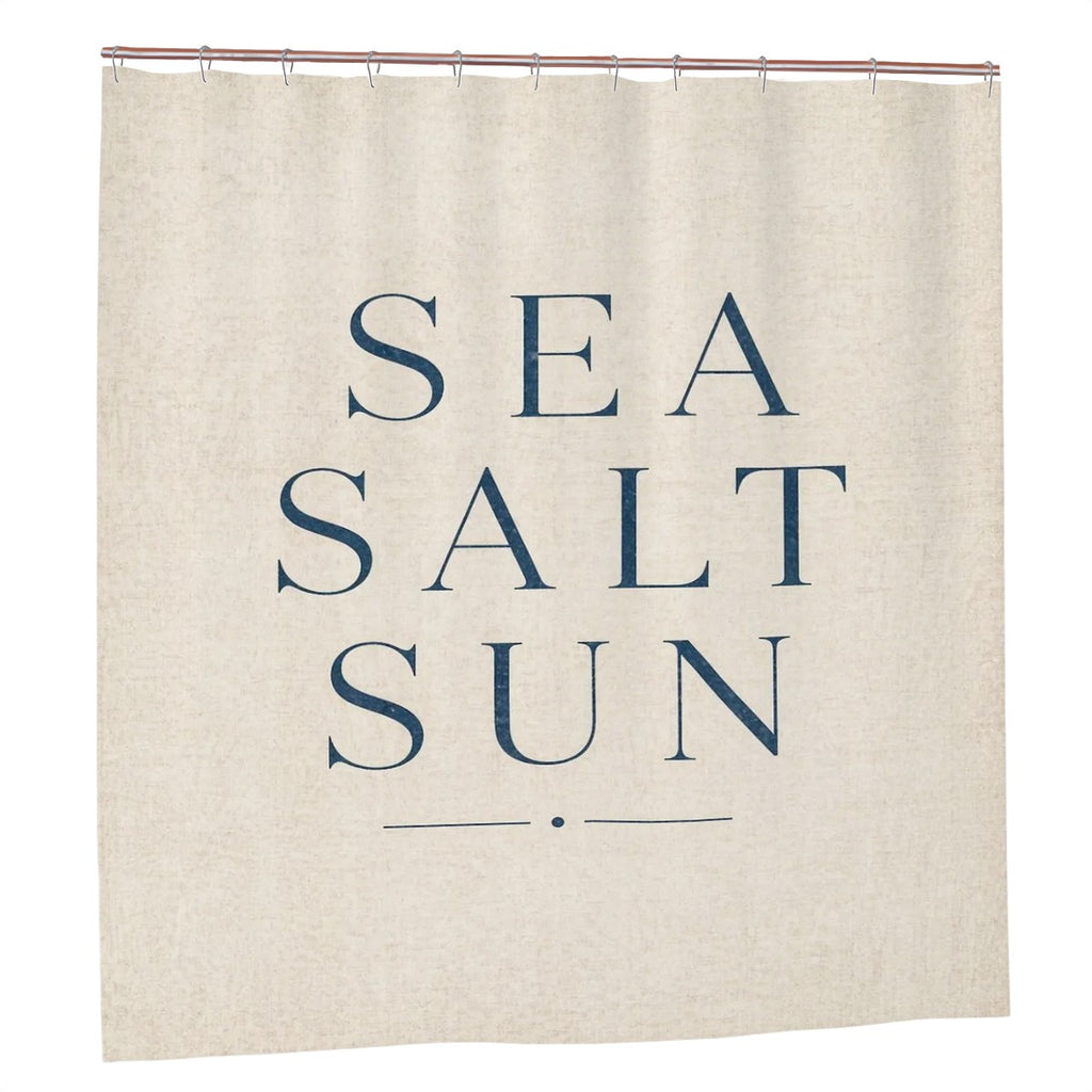 Sandy Beach bathroom decor shower curtain with ocean wave pattern, hanging on a rod in a modern bathroom setting.