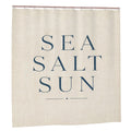 Sandy Beach bathroom decor shower curtain with ocean wave pattern, hanging on a rod in a modern bathroom setting.