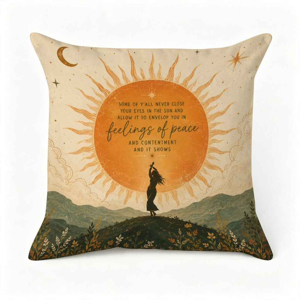 Decorative throw pillow featuring a sun illustration and inspirational peace quote.