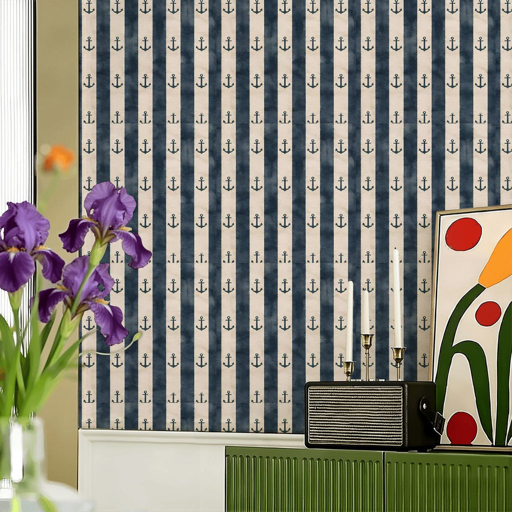Navy blue and white striped wallpaper featuring a repeating small anchor pattern.