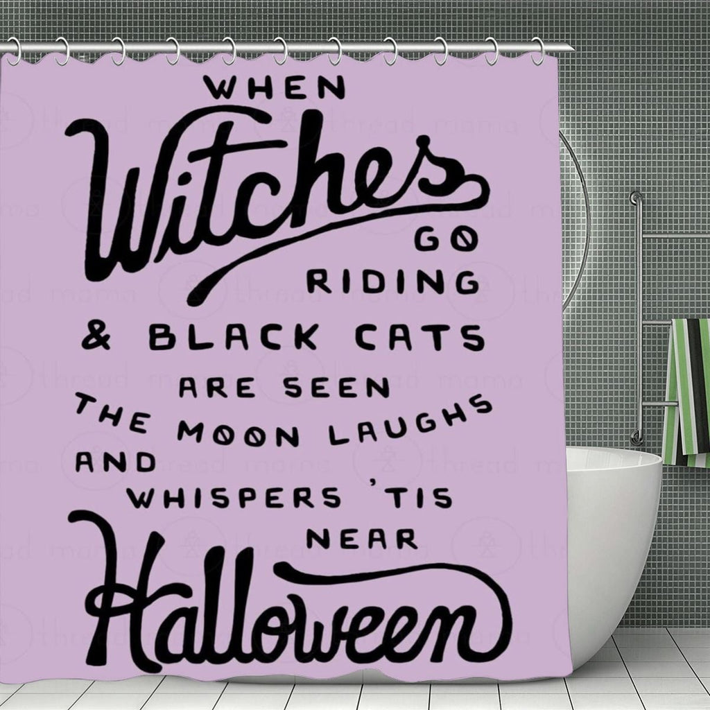 Lavender Halloween shower curtain with spooky witch and black cat typography.