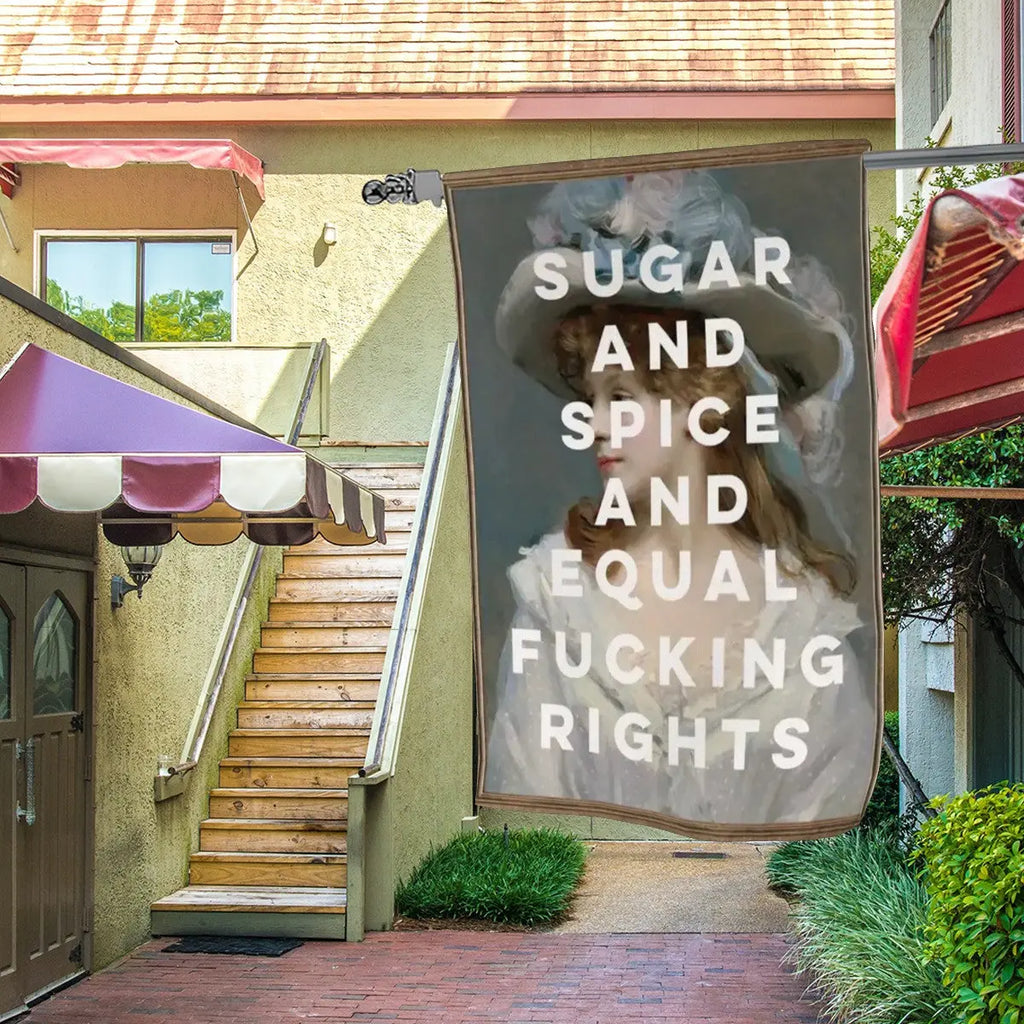 Colorful garden flag with bold lettering reading "Sugar and Spice and Equal F*$king Rights" by Sandy Beach garden decor.