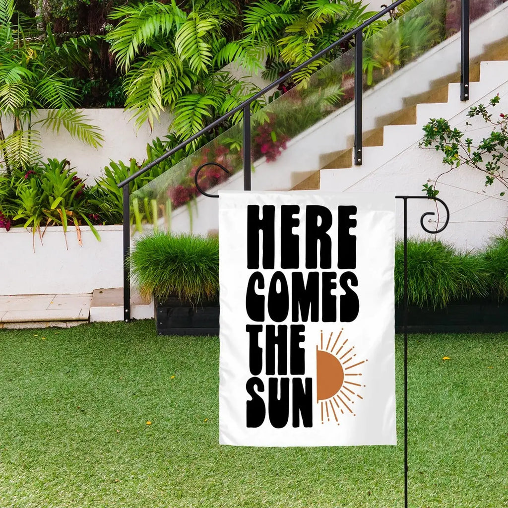 Colorful garden flag from Sandy Beach featuring a sun design, ideal for outdoor garden decor.