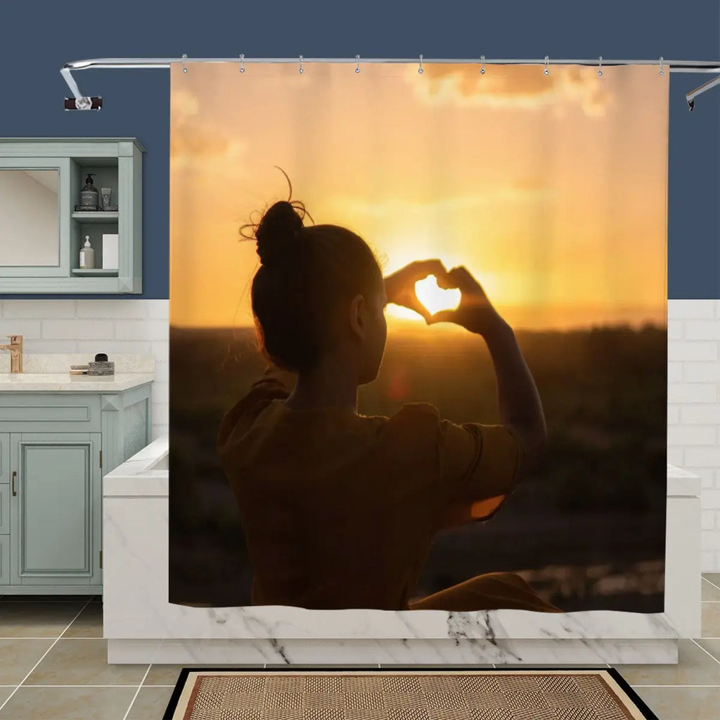 Silhouette Heart Sunset shower curtain by Sandy Beach features a romantic sunset scene for bathroom decor.