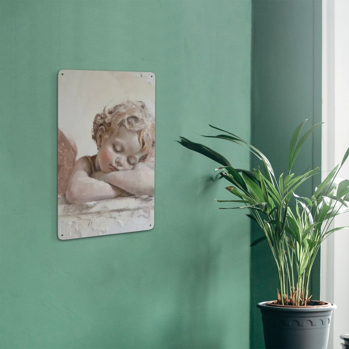 Oil painting style metal wall art featuring a sleeping cherub child on a green wall.
