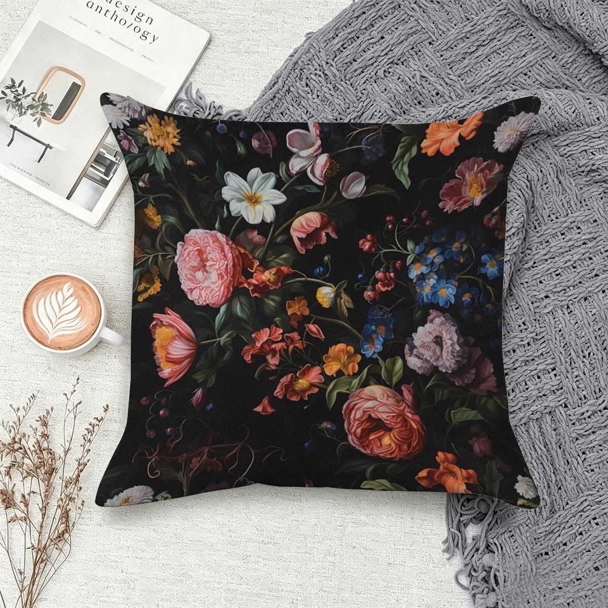 Decorative throw pillow featuring a dark moody floral pattern with vintage roses and wildflowers.