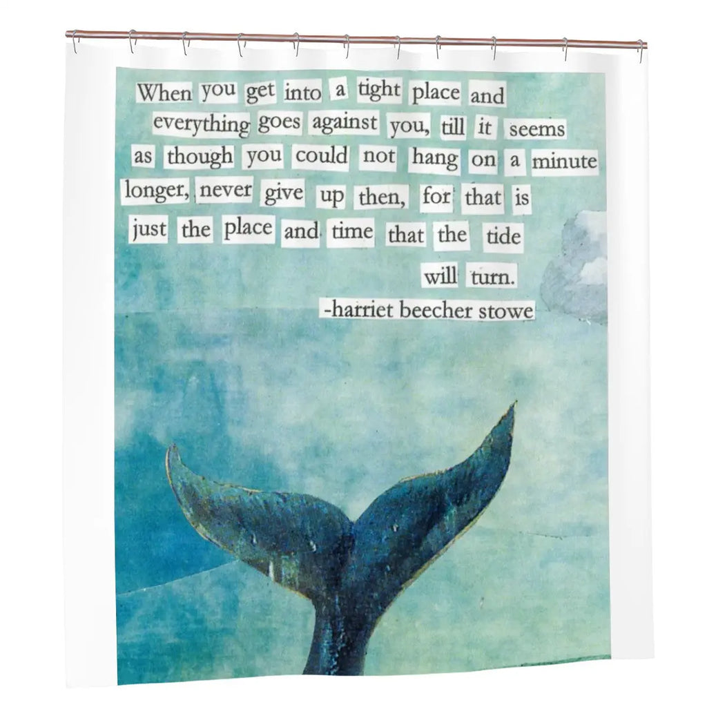 Whale tail bathroom shower curtain with ocean-inspired design, Sandy Beach brand, hanging in a modern bathroom decor setting.