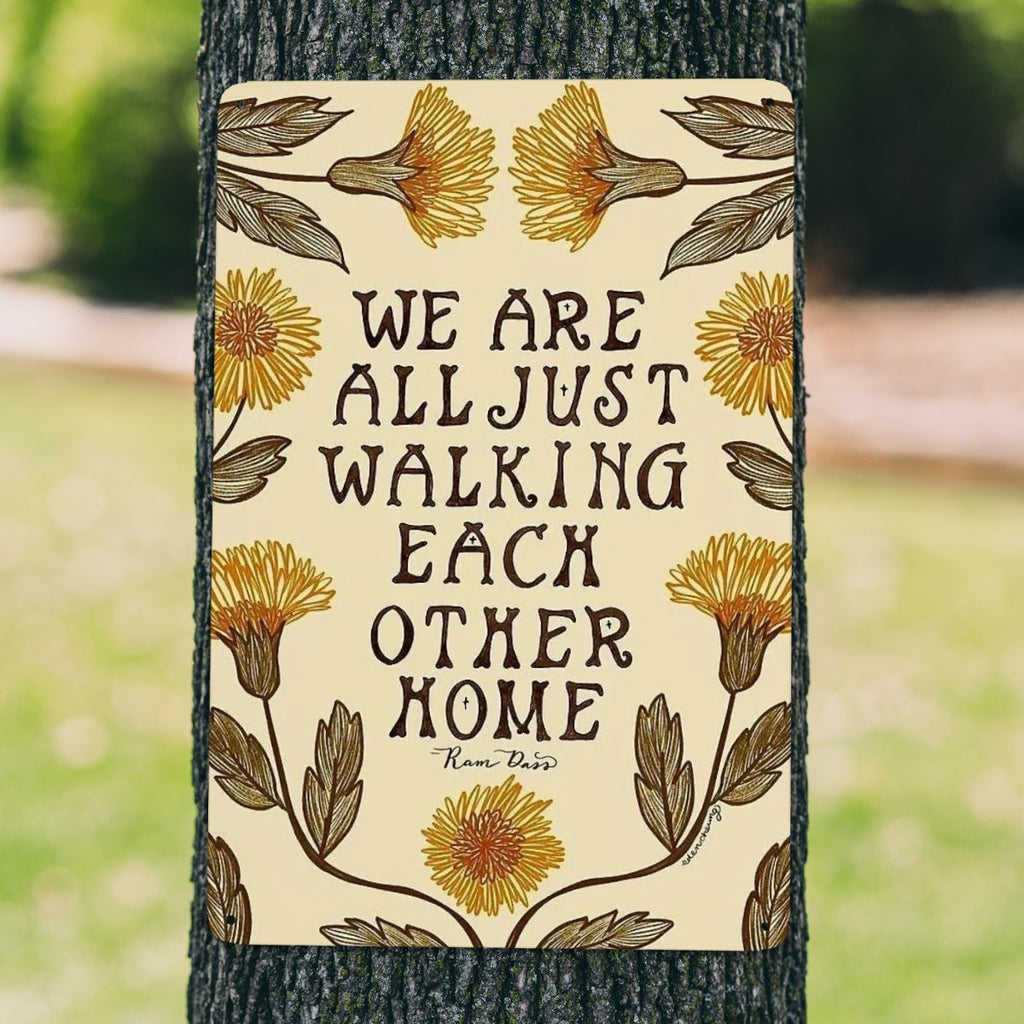 Floral garden flag with inspirational quote We Are All Just Walking Each Other Home by Ram Dass