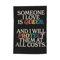 Colorful garden flag with "Someone I Love Is Queer" message, ideal for outdoor decor, by Sandy Beach.