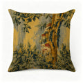Vintage tapestry throw pillow with a scenic forest and cottage landscape in gold and blue tones.